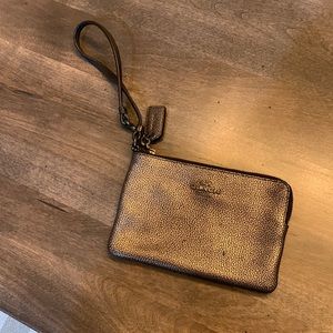Coach wristlet - black and gold